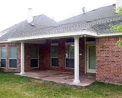 patio cover with ceiling-coined columns and barbeque